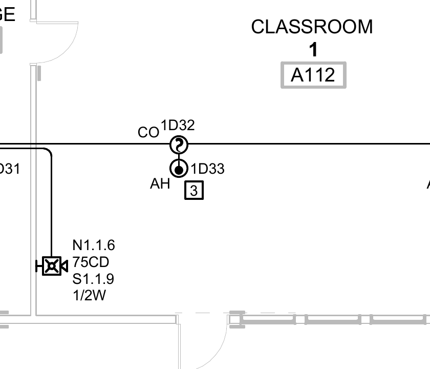 Original sheet E2.1: classroom A112 with devices 1D32 and 1D33. No device tagged 1D113 appears in this area.